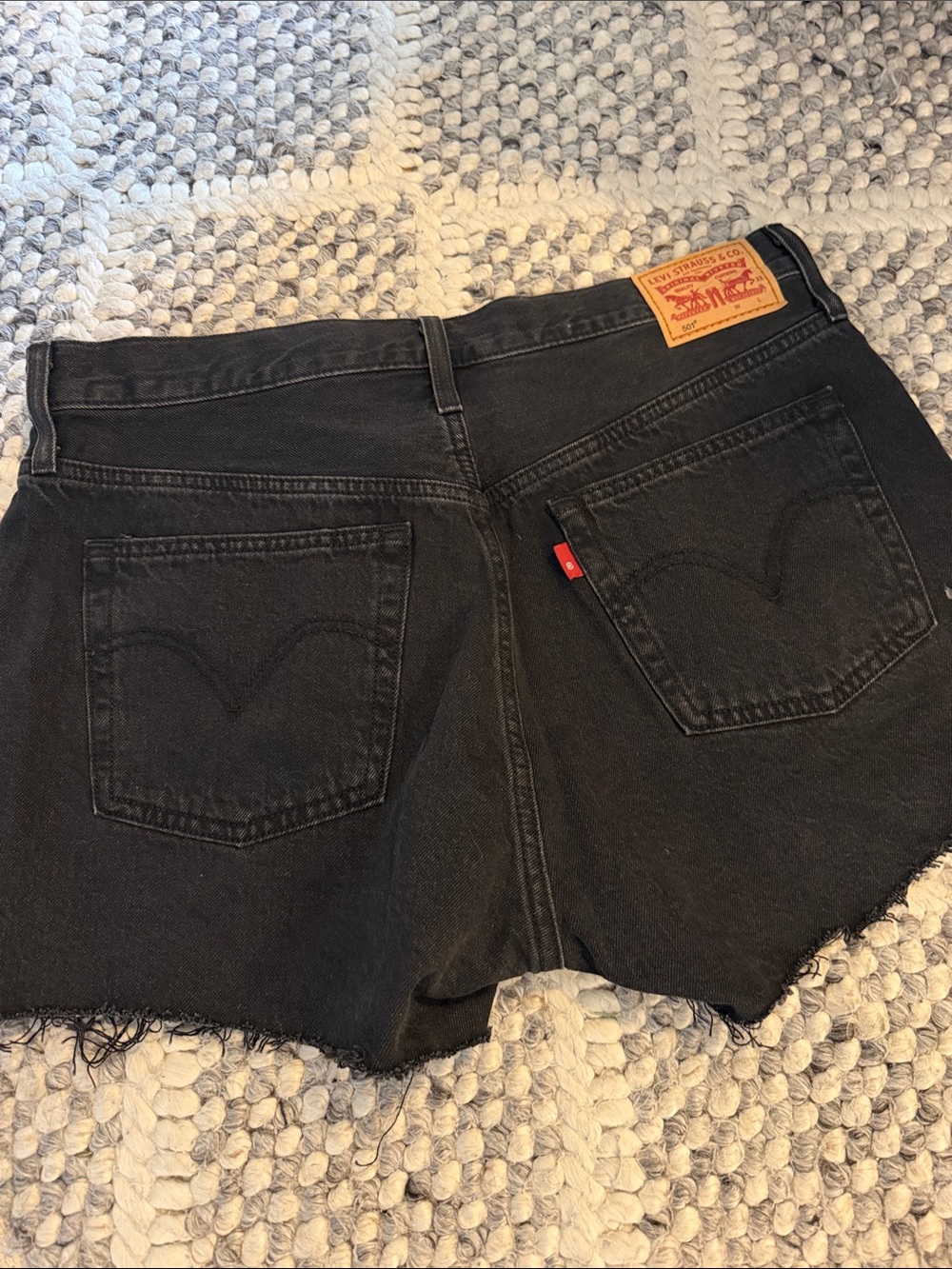 Levi's Black Denim Raw Hem Cutoff Shorts